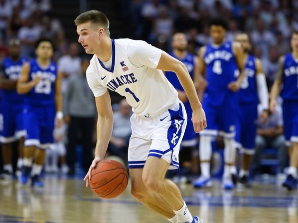 Comment un basketteur peut-il améliorer sa précision de tir en modifiant son angle de libération?